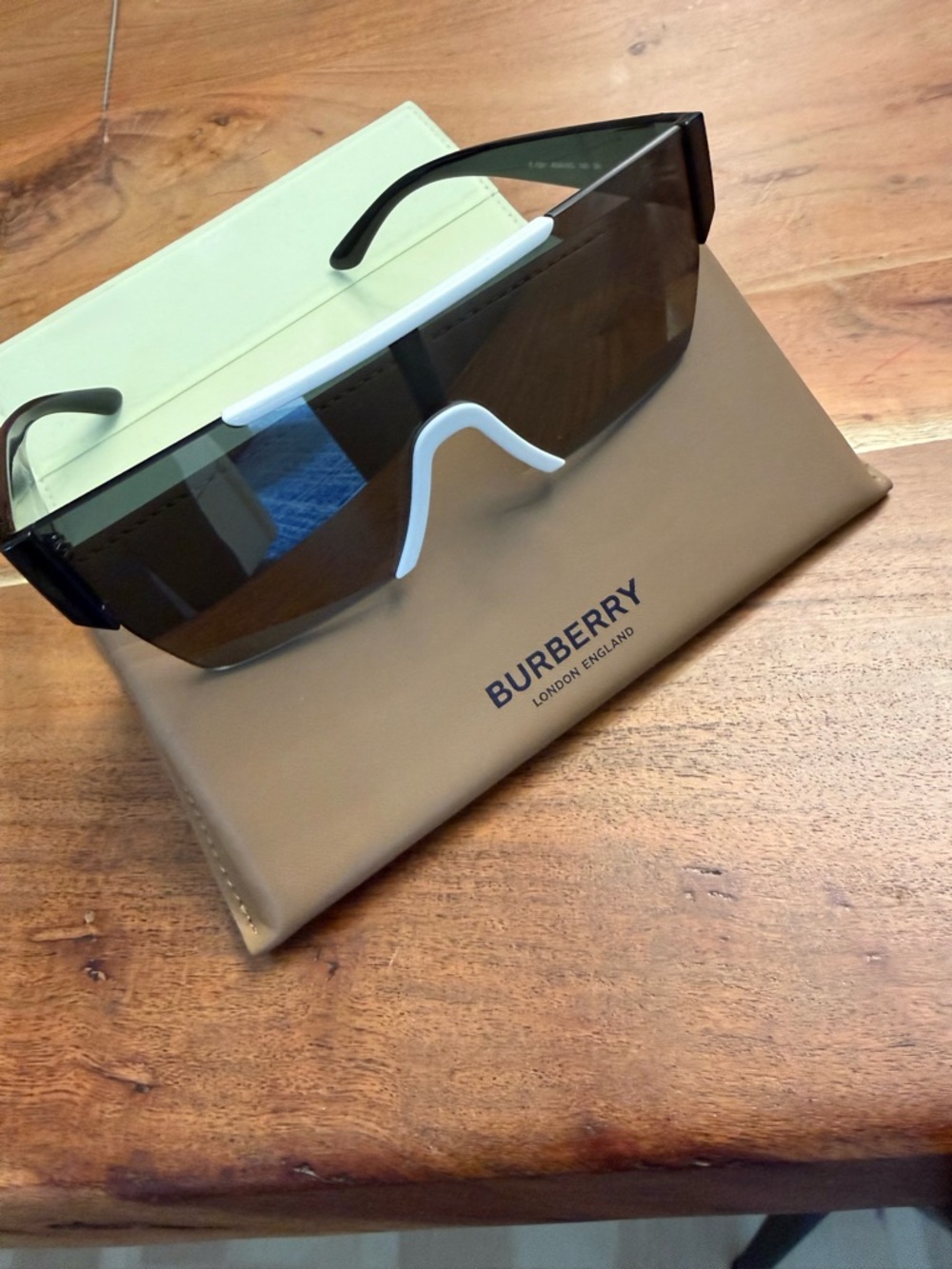 Burberry Black Shield Sunglasses with White Nose Bridge